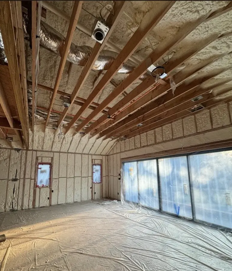 Interior walls and ceiling insulated with spray foam during new construction in Seven Hills